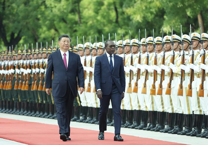 Le prÃ©sident chinois Xi Jinping et son homologue bÃ©ninois, Patrice Athanase Guillaume Talon, vendredi 1er septembre 2023 Ã  PÃ©kin, Chine.